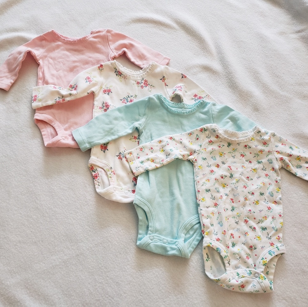 4 pack of Carters long sleeved onsies
